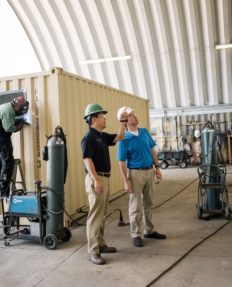 Stephen Shang, CEO at Falcon Structures, directs a project onsite