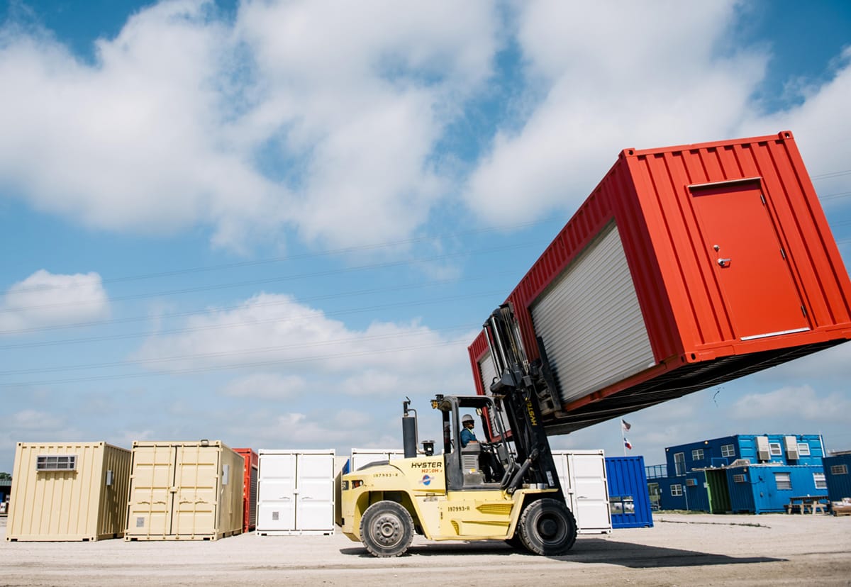 moving shipping containers at Falcon Structures