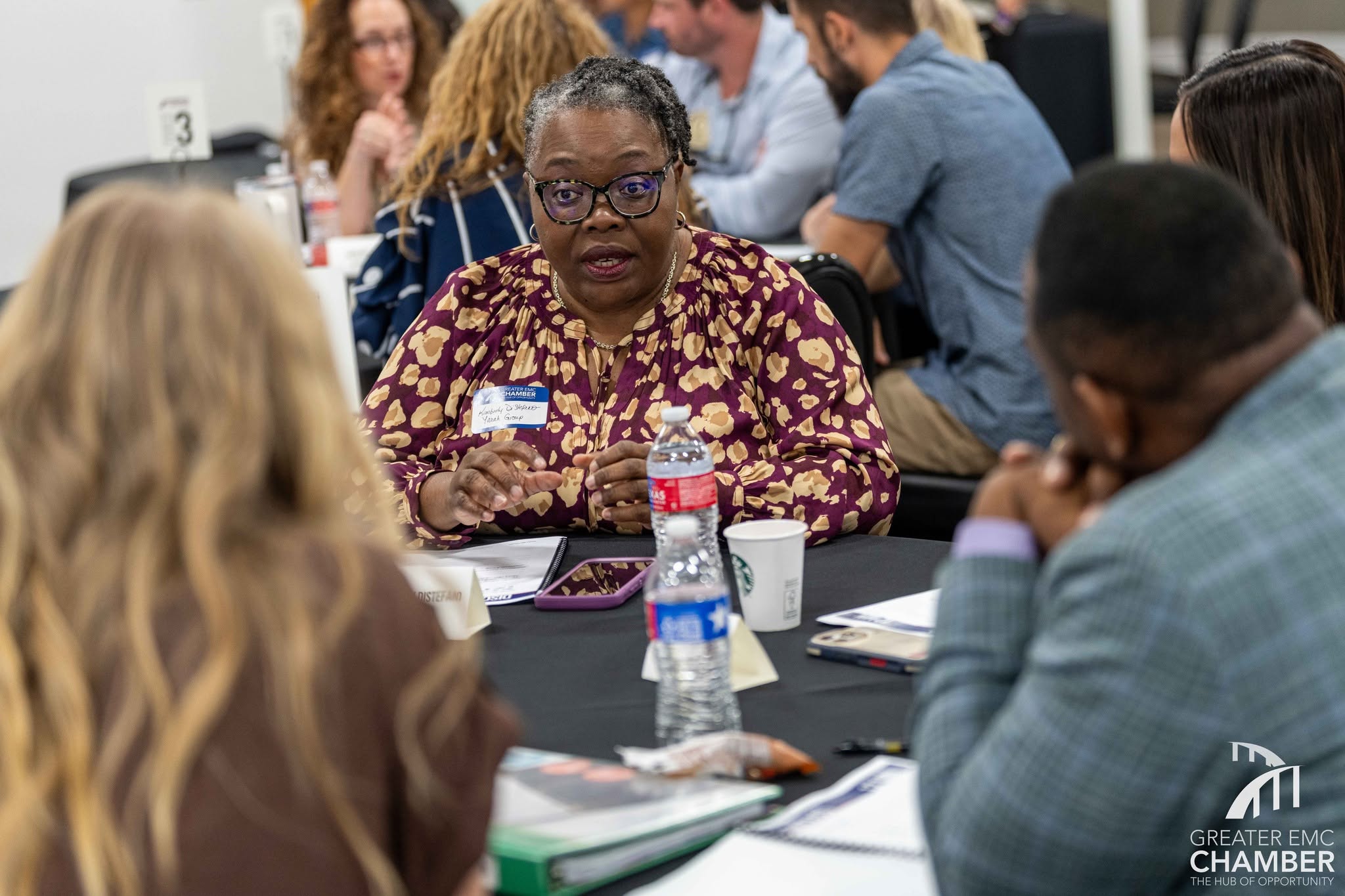 Kimberly DiStefano actively works through one of her group member's challenges, bringing her strong background and experiences from her human resources career