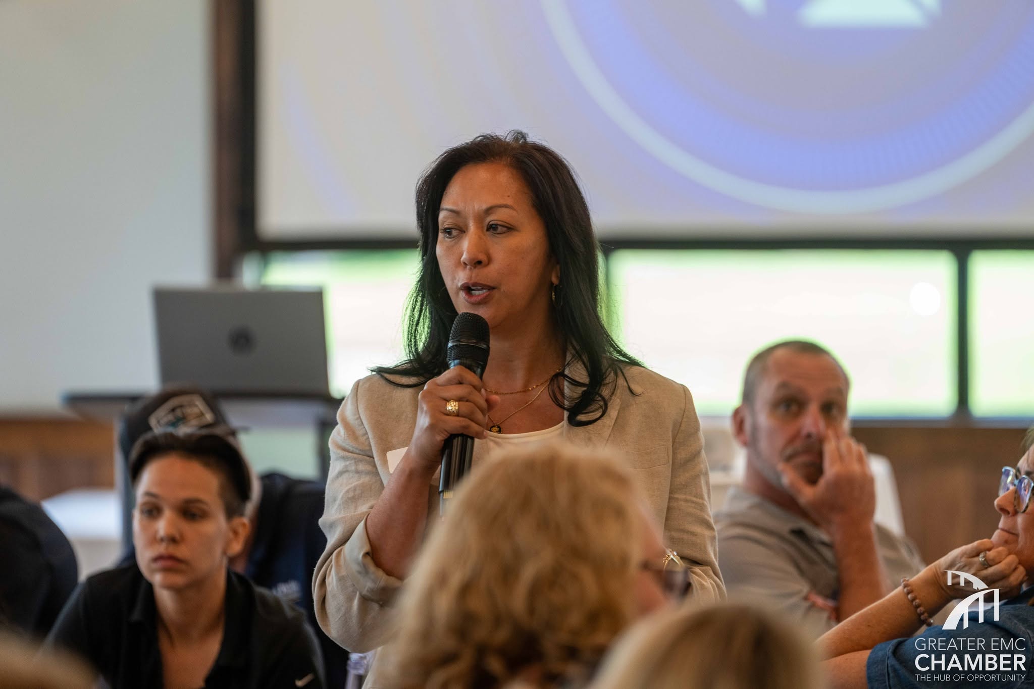 Microphone Evelyn shares her 30-second introduction at “The Great 88” Business Networking Breakfast, aiming to build further on the relationships she has made in the Chamber.