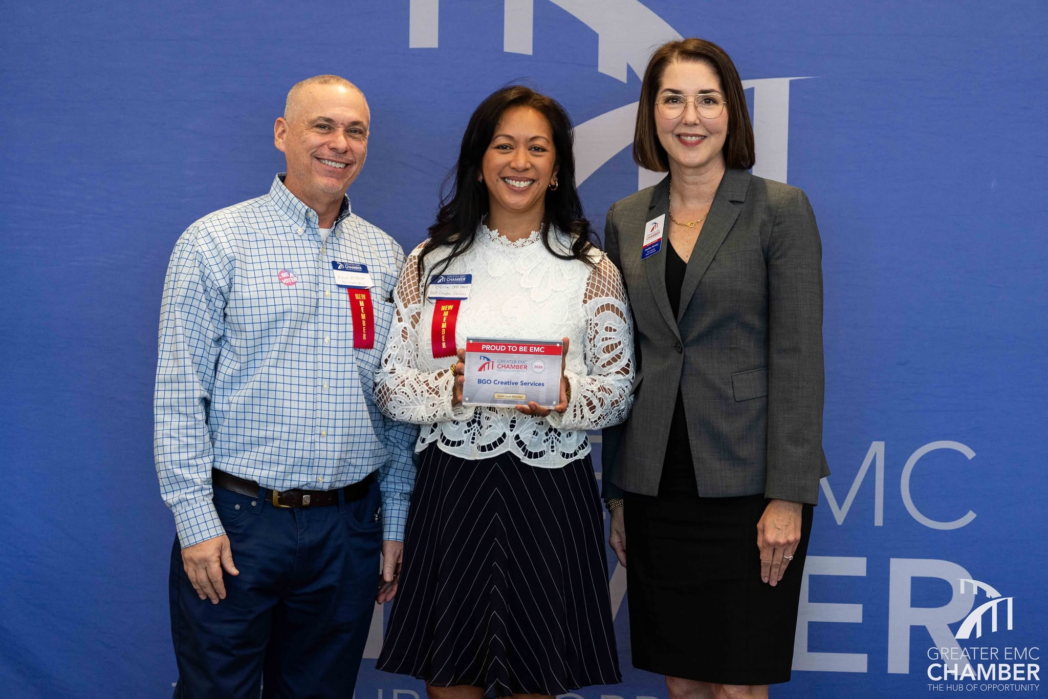 New Member Recognition After initially joining the Chamber, BGO Creative Services was recognized at a Chamber Luncheon with a new member plaque beside her colleague and the Chamber Board Chair.