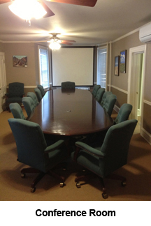 Conference Room with projector screen.