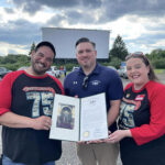Milestone citation held by owners and employees of Mahoning Drive In Theater