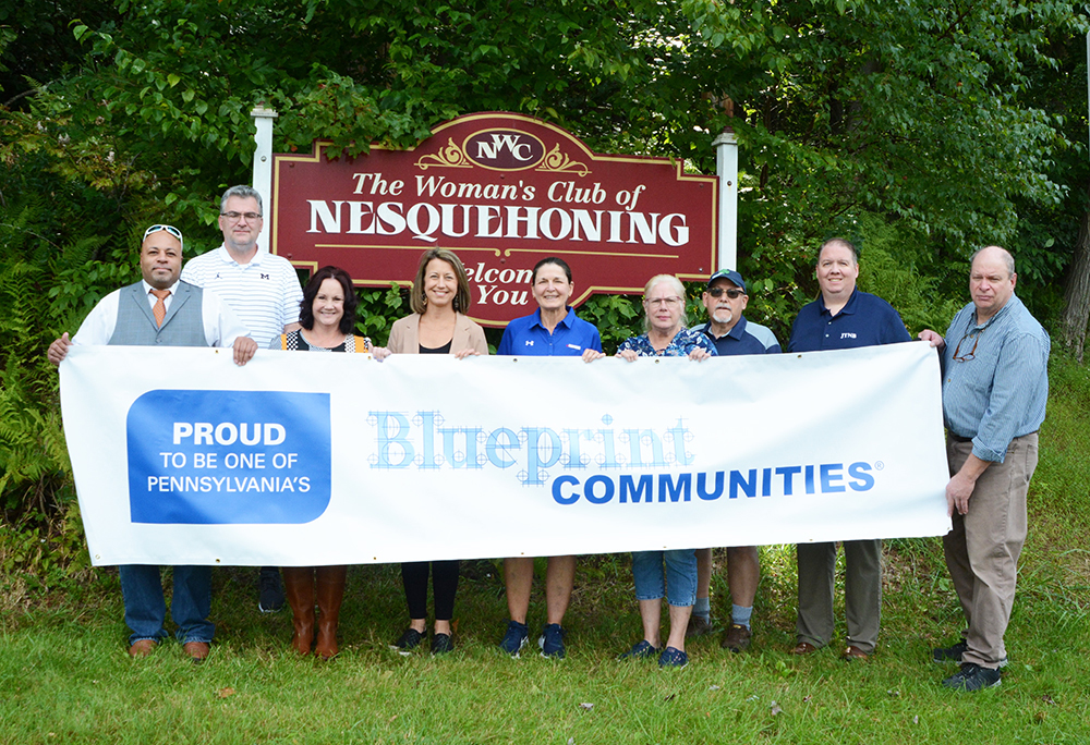 Nesquehoning Group holding Blueprint Communities banner