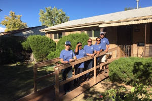 YLC Members build a ramp for HBF recipient