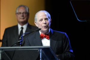 S. Robert August addresses the audience at a ceremony during IBS 2017.