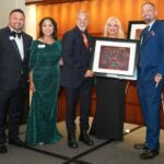 Group photo with Manuel "Manny" Cruz, Civic Award of the Year recipient