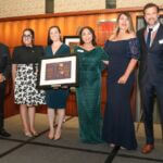 Group photo with Puentes de Esperanza, Civic Award of the Year recipient