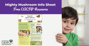 Child holds poster with image of mushroom info sheet