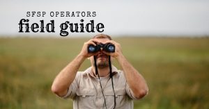 man looking through binoculars with words sfsp operators field guide above him