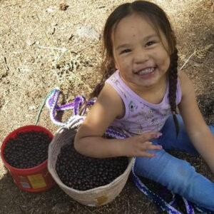 Child of CTWS collecting Huckleberries