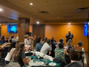 David W. Haig, the 2025 The Joseph A. Cushman Award for Excellence in Foraminiferal Research Awardee gives a talk at the reception.