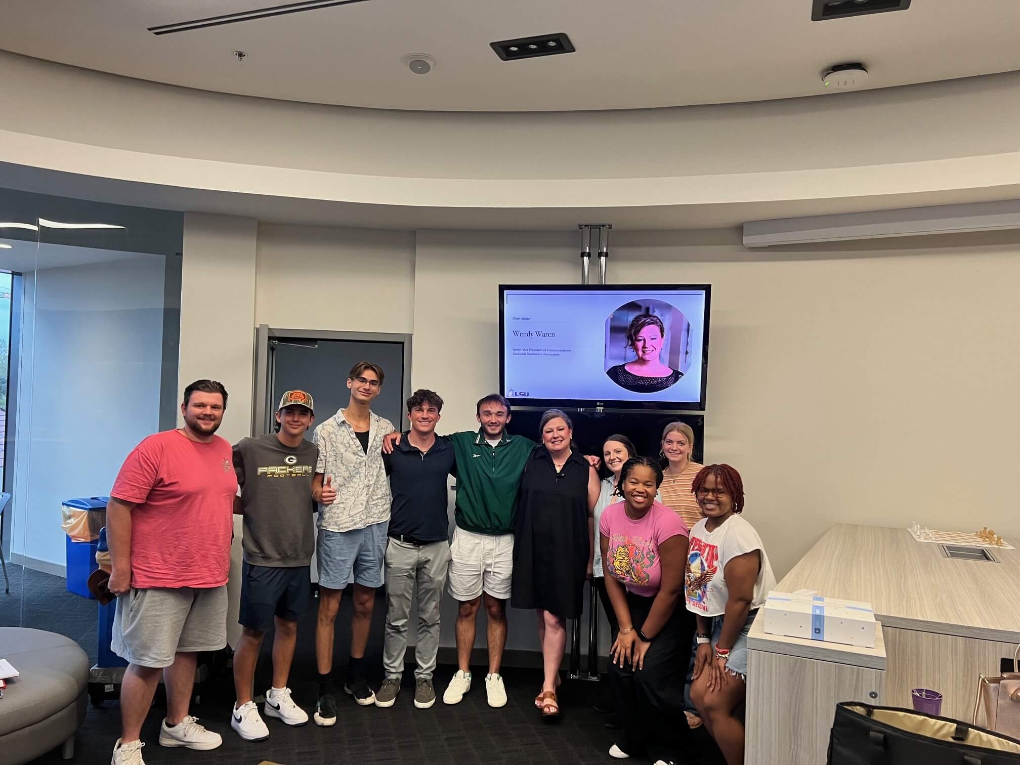 SVP of Communications Wendy Waren surrounded by the first cohort. 