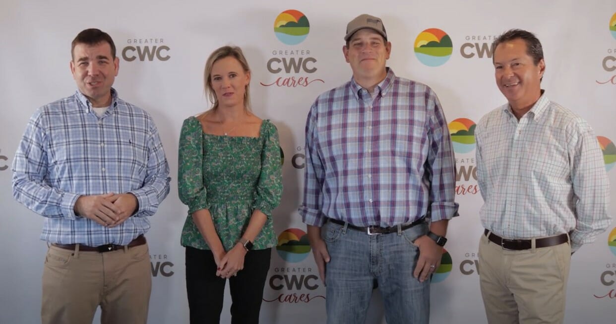 Pastor Eddie Coakley of Trinity Baptist Church, Haley Shealy of Dickerson Children's Advocacy Center, Chuck Underhill with House of Raeford, and Chamber CEO &amp; President, Tim James