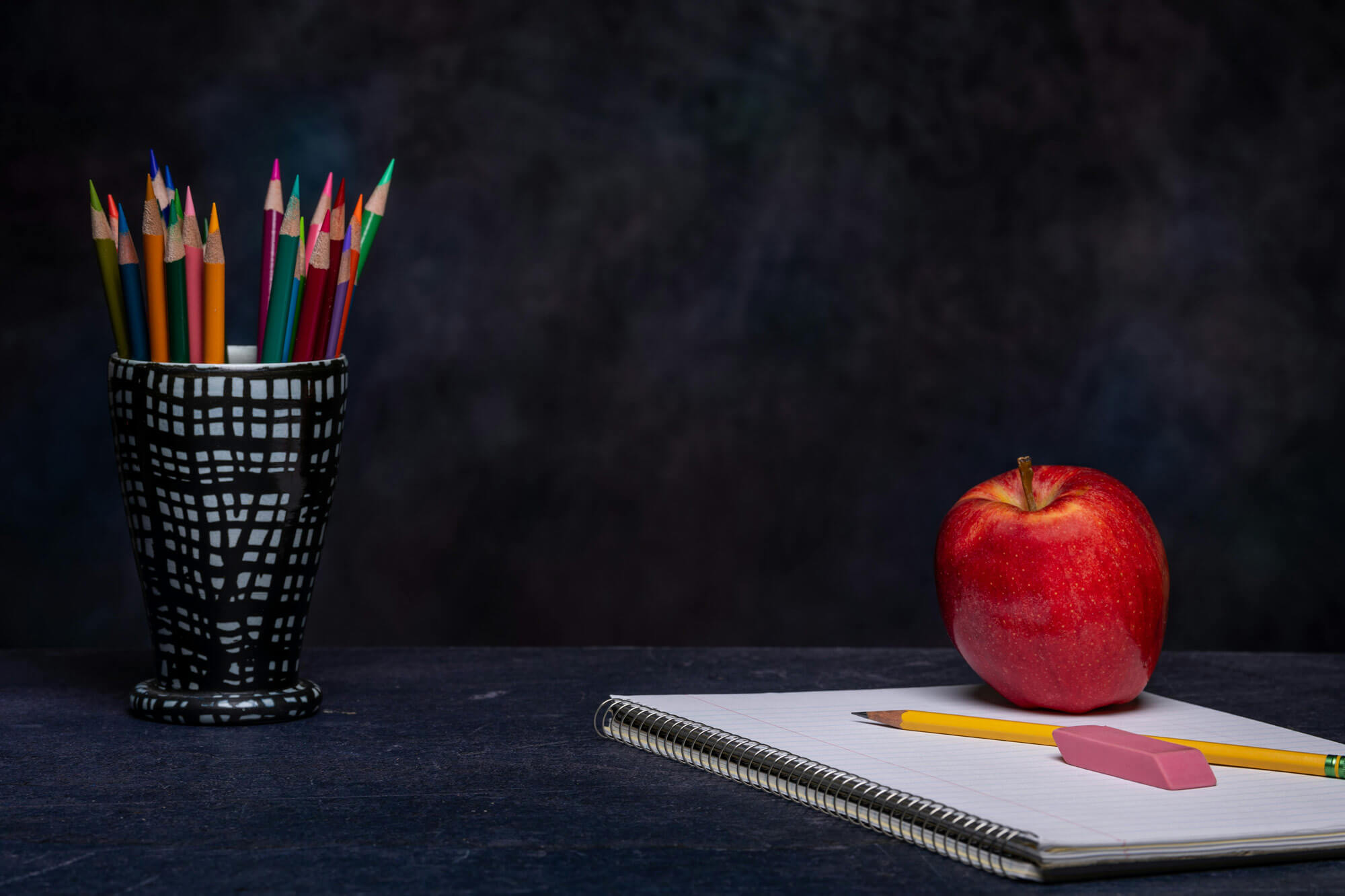 apple on a desk