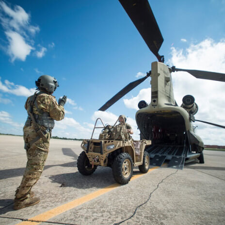 helicopter unloading a vehicle