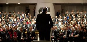 man giving presentation to audience