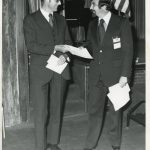 Walter J. Maytham, with Art Elias. The John Wiley representative is receiving the 1974 Best IS Book Award