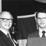 Andrew Aines receiving 1982 Award of Merit from Charles Davis