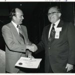 John Sherrod receiving Certificate of Appreciation from Herbert White (r) at ASIST '73