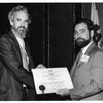 Michael Arbih receiving Best Information Science Book Award for 1973 from James E. Rush