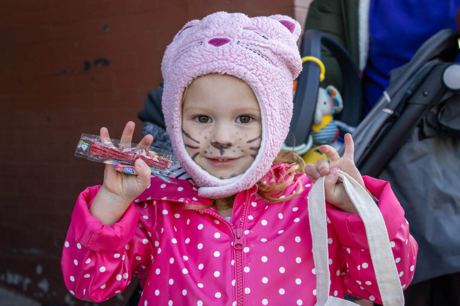 A young girl with face paint at the Downtown Trick-Or-Treating