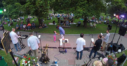 musical band playing in park