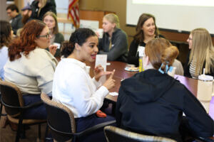 Attendees networking at the Young Professionals Network - Breakfast Club event.