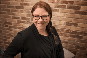 Headshot for May 2025 Women Connect speaker, Natalie Reiter, who will speak on how to manage stress in high-pressure situations.