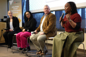 Jane Vangsness Frisch, Whitney Harvey, Mike Arntson and Colette Campbell on stage at The Pulse of DEI