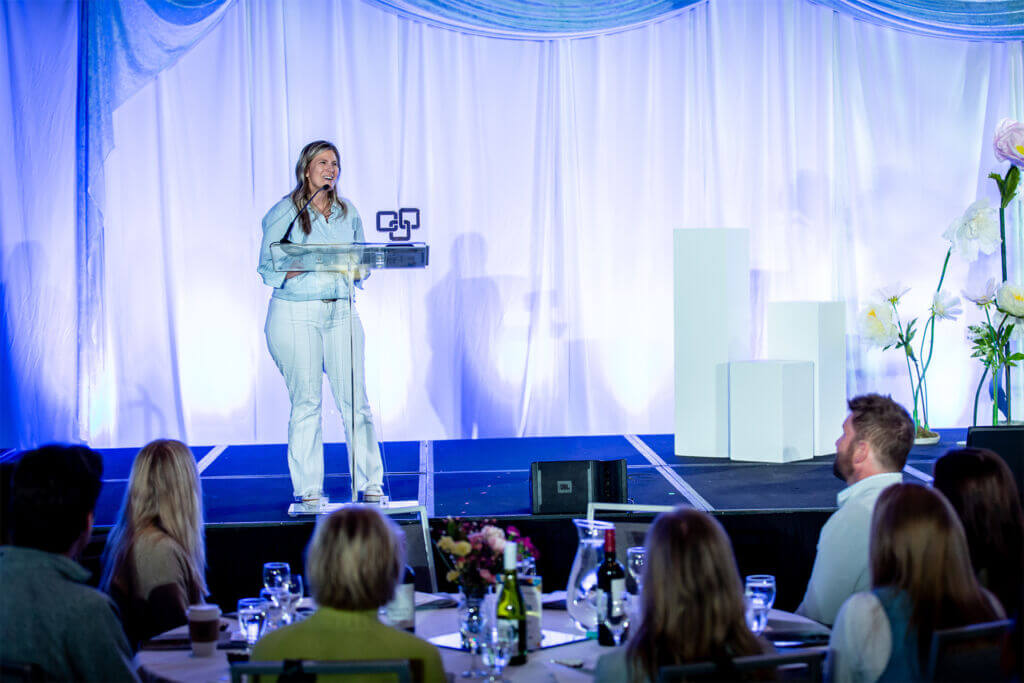Sarah West, Owner, Coach and Consultant at Light Consulting gives an acceptance speech after being named Small Business of the Year on stage at the 2025 ChamberChoice Awards.