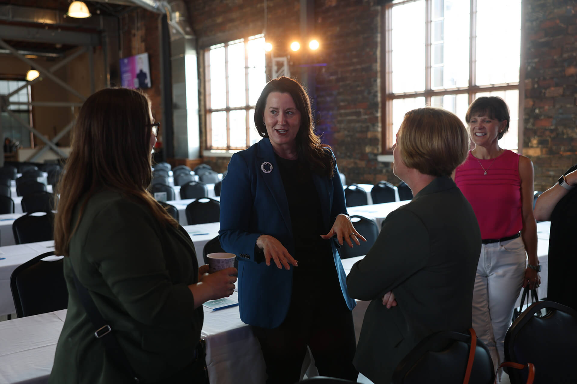 Kristi Huber speaking to Women Connect attendees about redefining success during the July 25 Women Connect session.