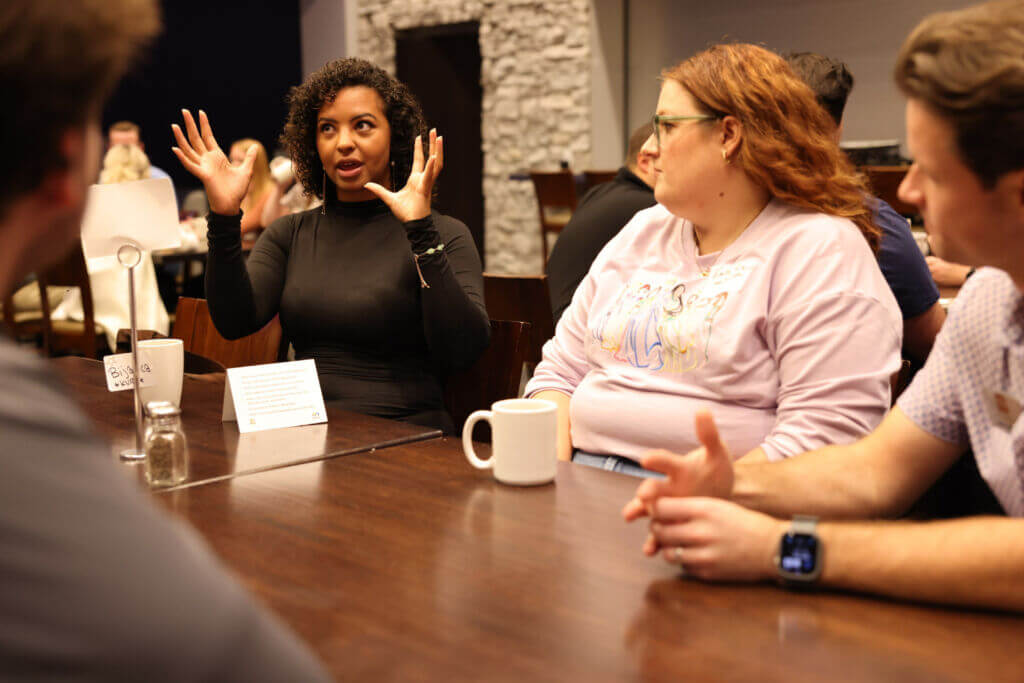 Image of young professionals connecting to resemble expectation for the YP Summit
