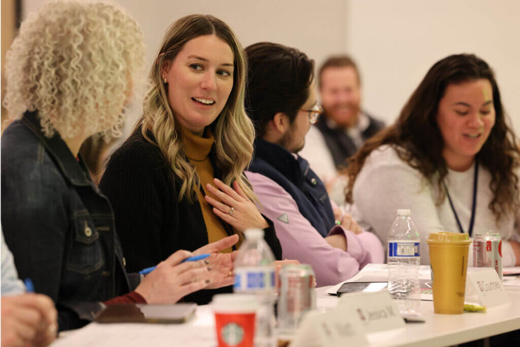 Leadership FMWF participants reflect on lessons of authentic influence during a session.