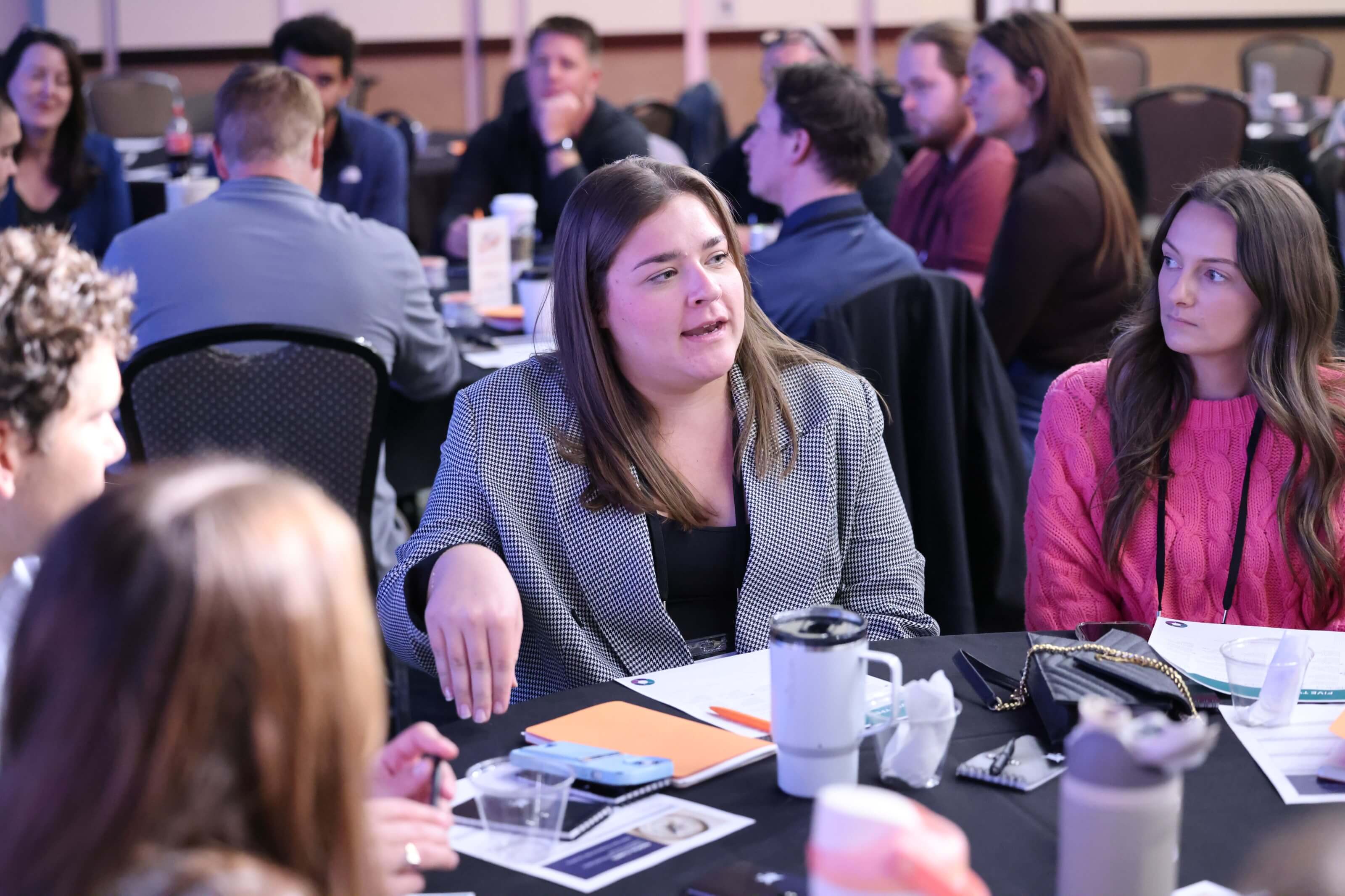 Young professionals participate in a roundtable discussion during the 2025 YP Summit, reflecting on Radical Clarity and how to lead with purpose.