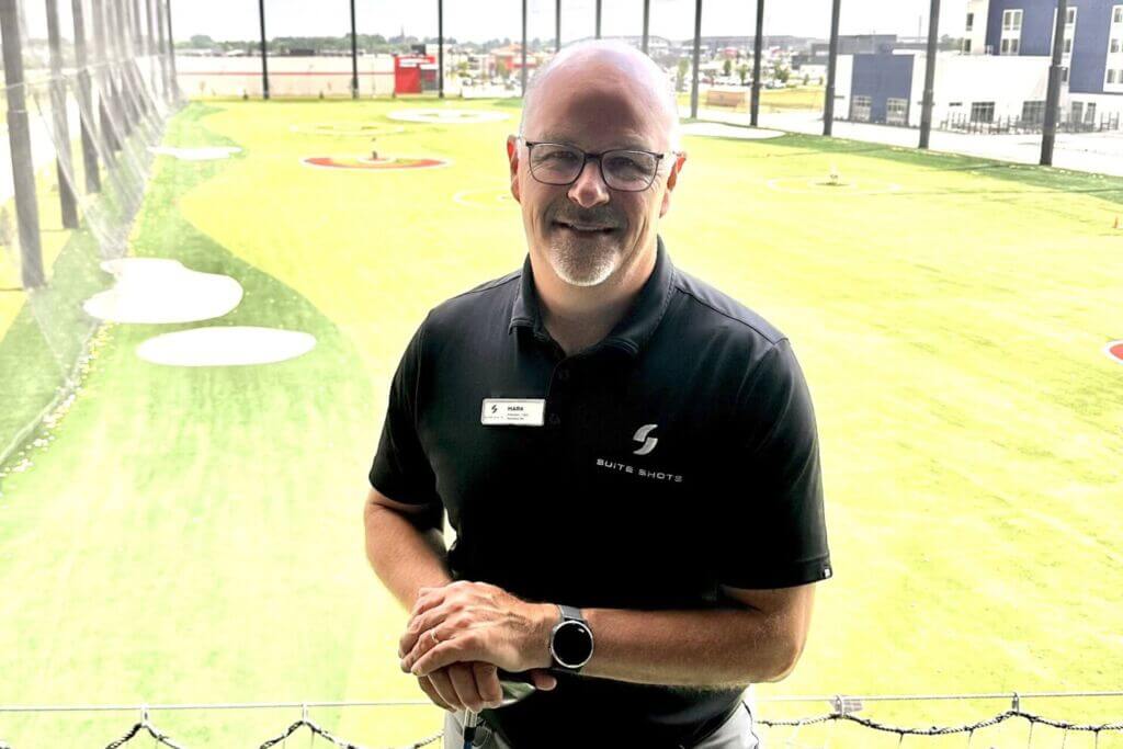 Mark Johnson, founder of Suite Shots, inside the region’s premier golf entertainment venue