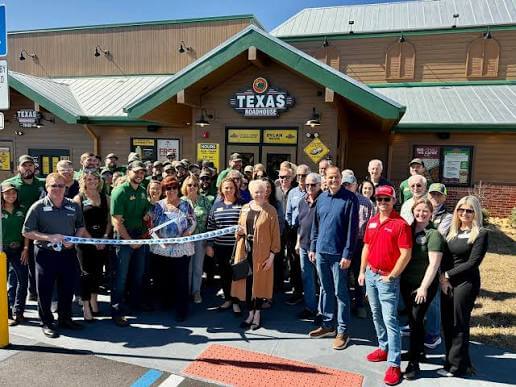 Ambassador ribbon cutting Texas Roadhouse