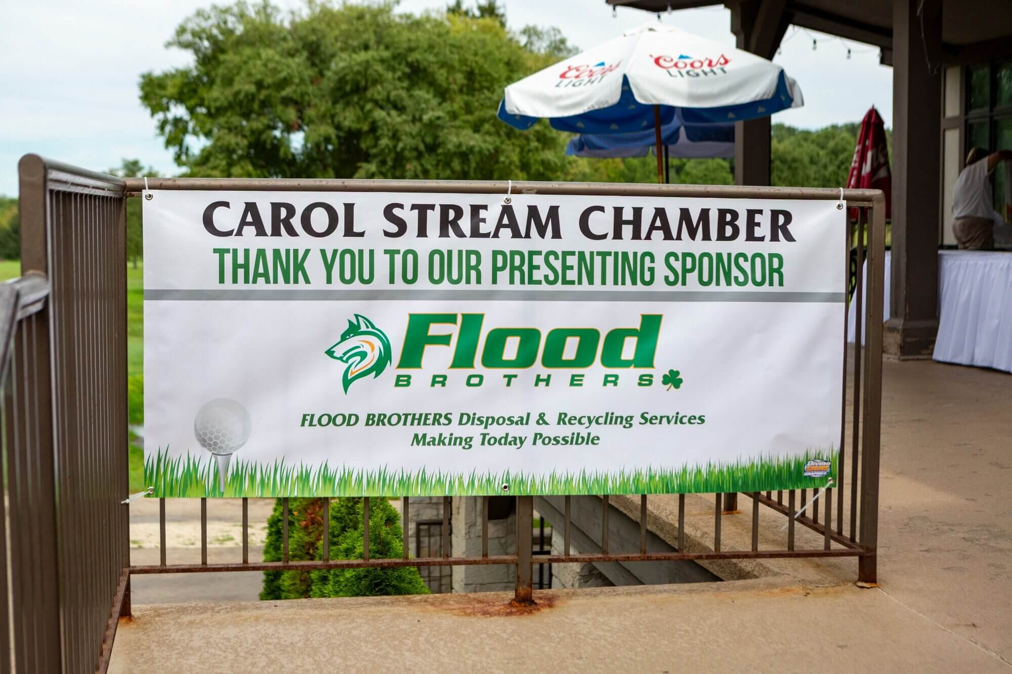 Flood Brothers presenting sponsor sign at the Chamber golf outing