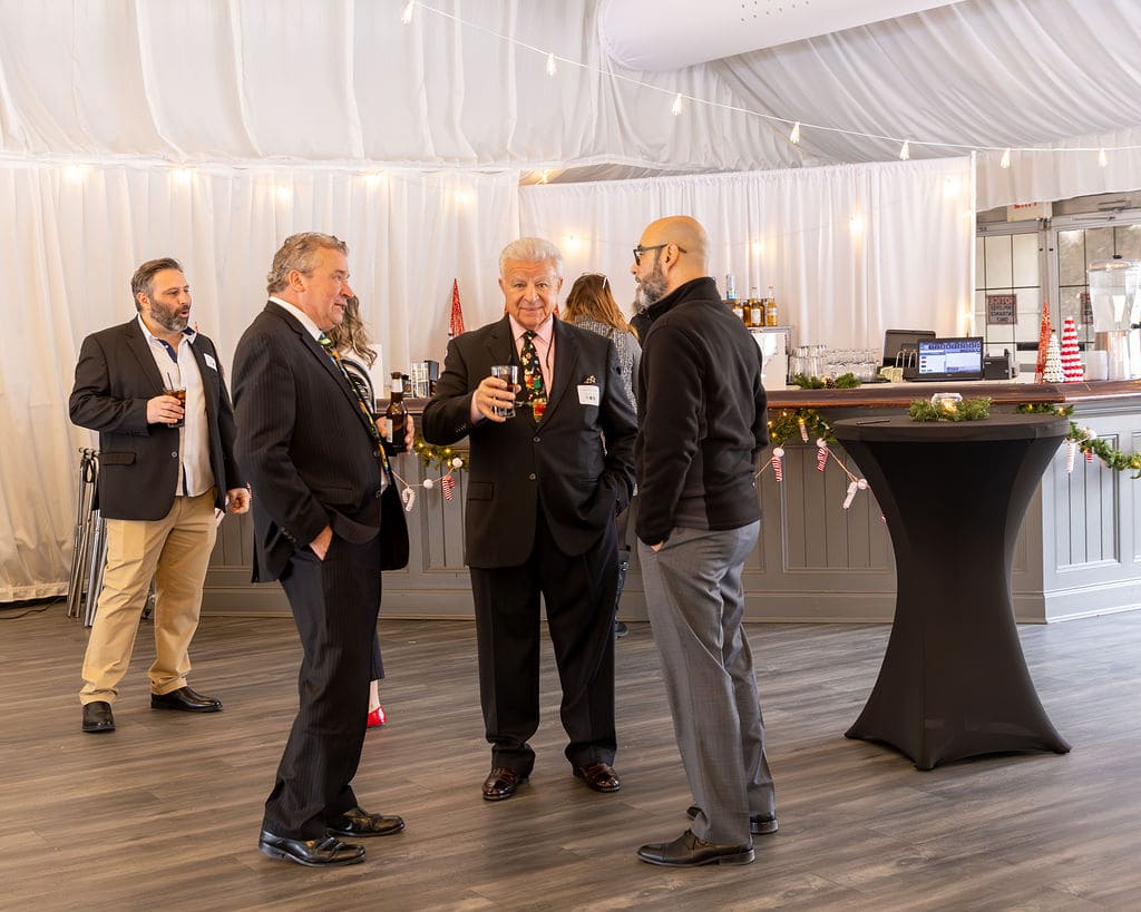 Chamber members networking during the holiday celebration
