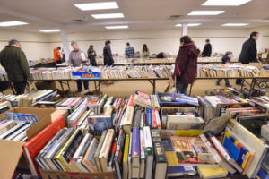 Patrons check out a large selection of reading material at the book sale sponsored by the Friends of the Colts Neck Library on March18