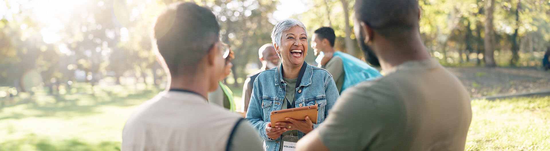 Happy people talking to each other outside