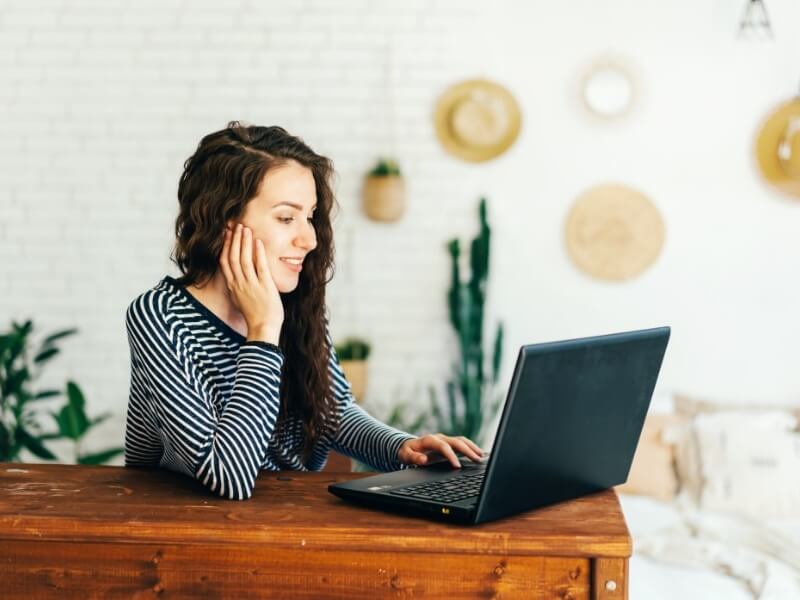 woman on laptop browsing