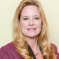 Treasurer Kathleen Alexander Partner ​Sax, LLP