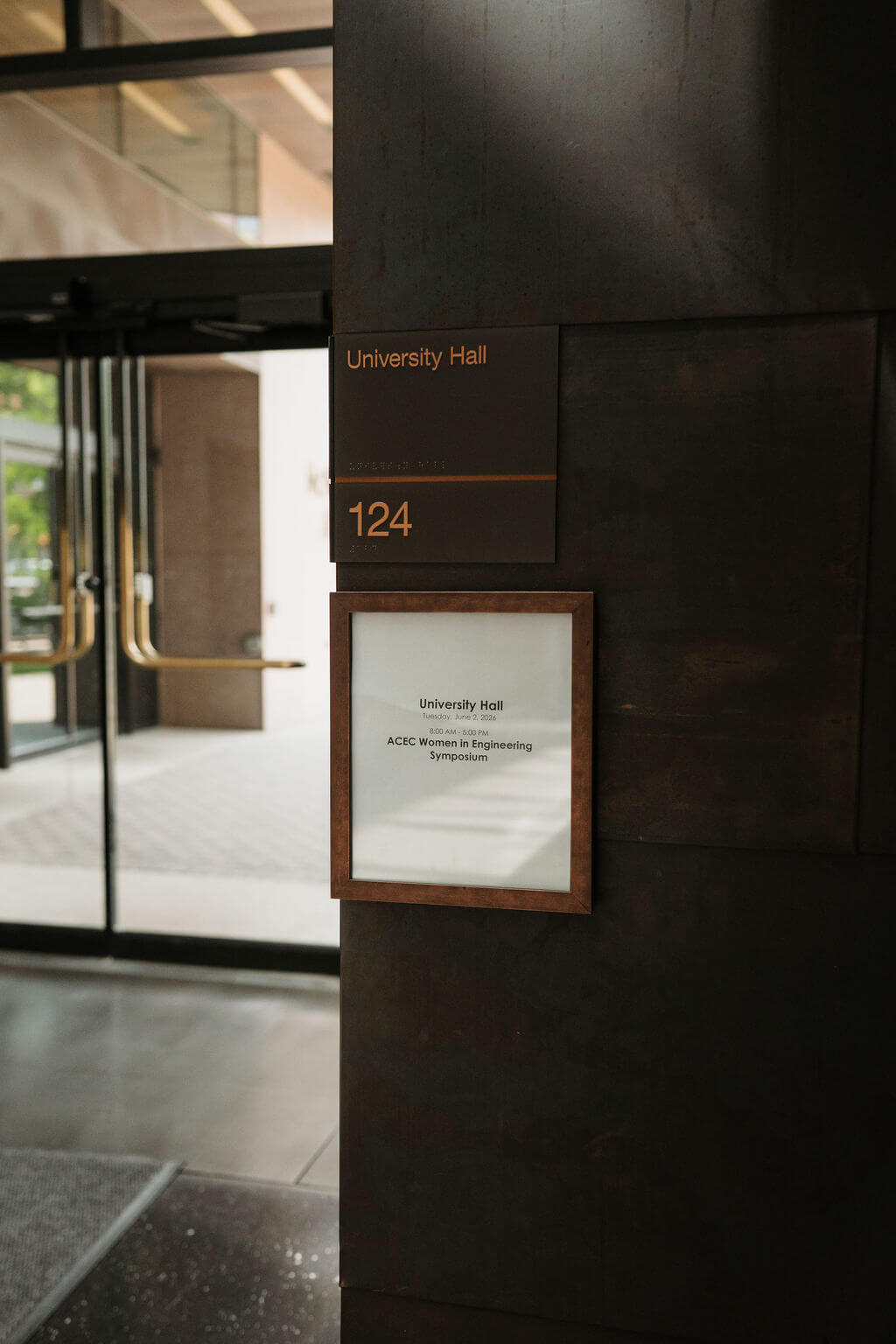 Event signage for the ACEC Women in Engineering Symposium at University Hall
