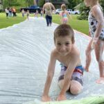 kids playing in water slide