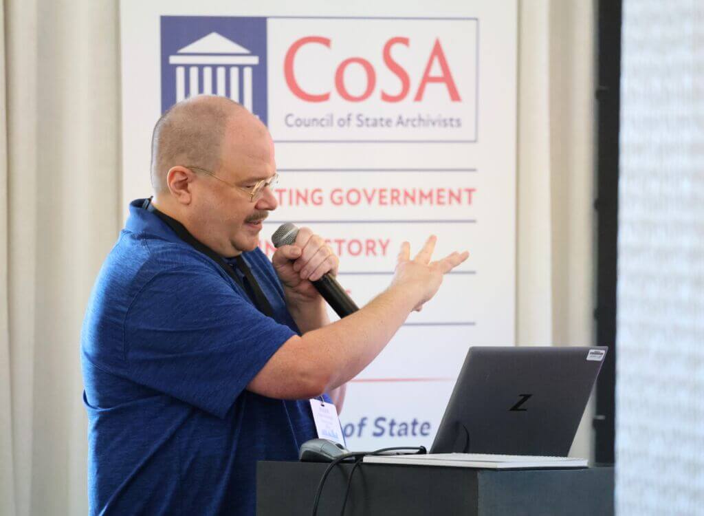 A speaker presents at the 2024 CoSA Annual Meeting