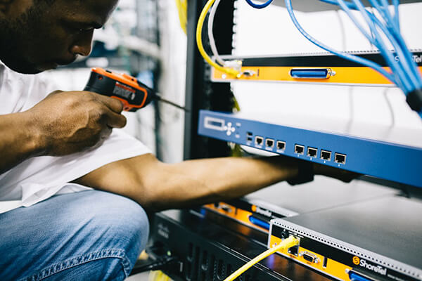 man working with a drill