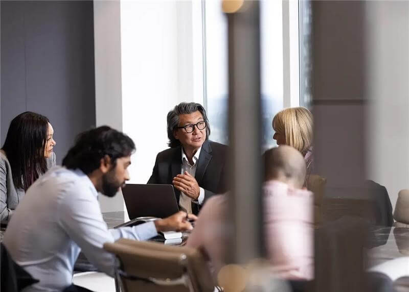 Cross-functional team meeting in a modern office_ Cross-functional team meeting in a modern office_