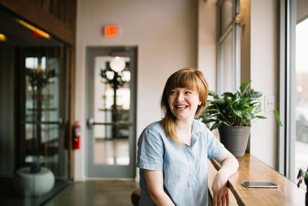 woman-smiling-inside-entrepreneur woman-smiling-inside-entrepreneur