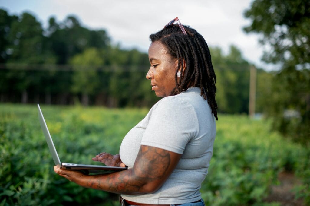wifi-internet-laptop-outside-remote-farm-woman outside wifi-internet-laptop-outside-remote-farm-woman outside